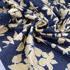 Printed polyester cinzato with floral design in dark blue, ecru, and yellow, very crunchy and not transparent, ideal for structured garments and bold pieces. High-quality deadstock collected in Stock from a Maison de Couture in Italy.