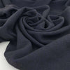 Blend of virgin wool, polyamide and linen in dark blue and black.&nbsp;High quality deadstock fabric.