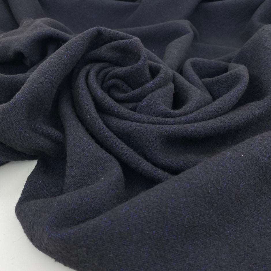 Blend of virgin wool, polyamide and linen in dark blue and black.&nbsp;High quality deadstock fabric.