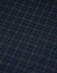 Punto Milano double-face viscose polyester. The fabric is squared printed, stretch, blue and black. High-quality deadstock collected in Stock from a Maison de Couture in Italy.