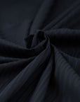 Soft and black cotton jacquard. High quality deadstock fabric.