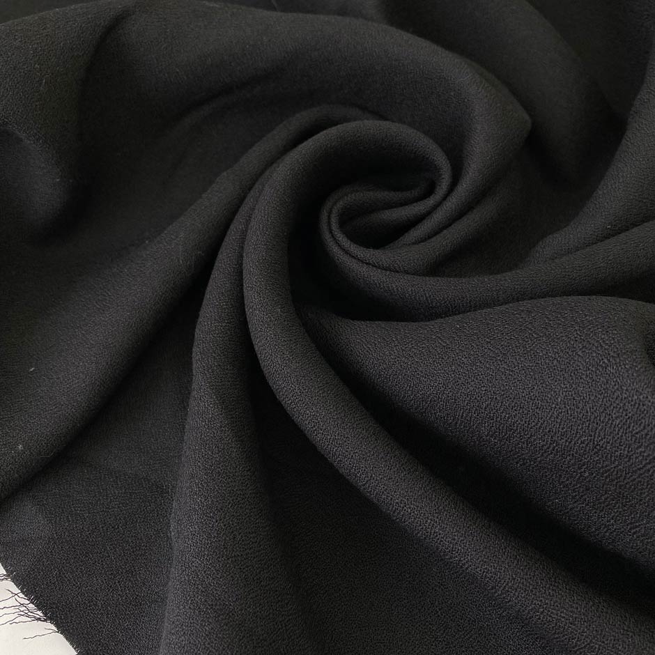 Soft and flowy cotton and wool crêpe with a slight sheen. Not transparent and ideal for jackets, dresses, and skirts.High-quality deadstock collected in Stock from a Maison de Couture in Italy.