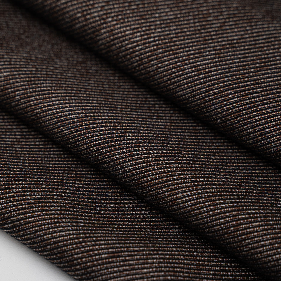 Cavalry brown twill of viscose and polyester with gabardine weave. High-quality deadstock fabric collected in Stock from a Maison de Couture in Italy.