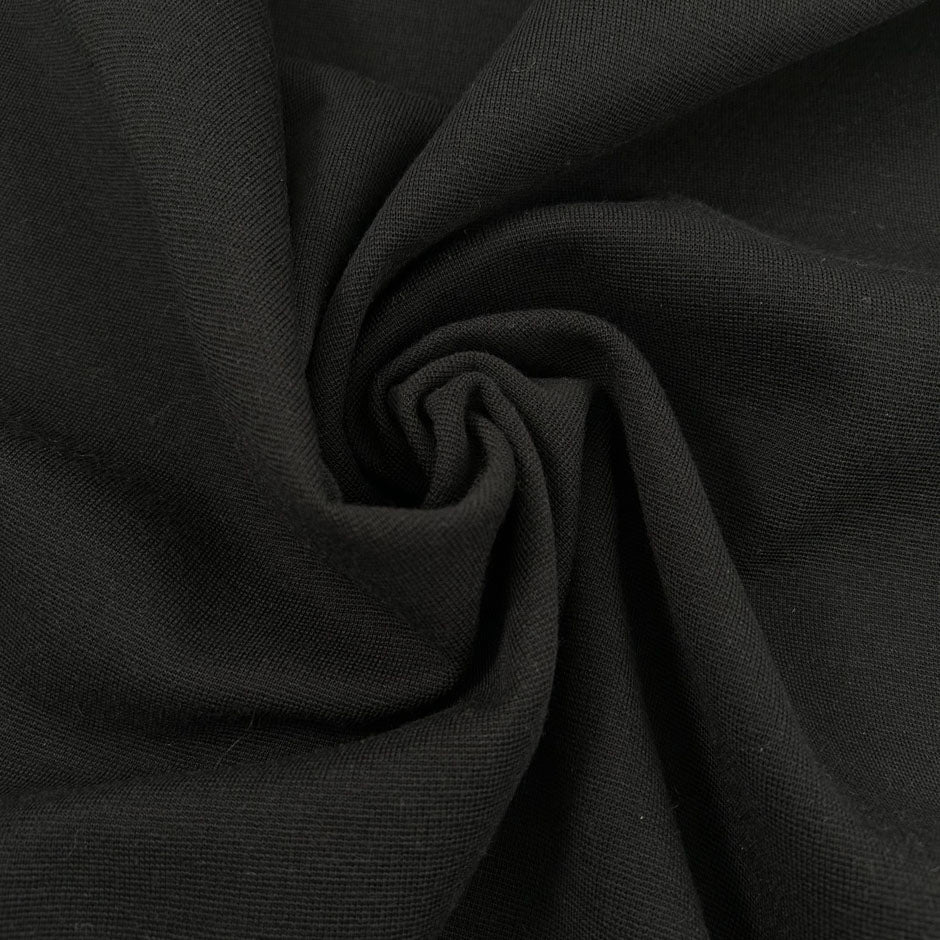 Black heavy punto milano jersey, stretch, soft. High-quality deadstock collected in Stock from a Maison de Couture in Italy.