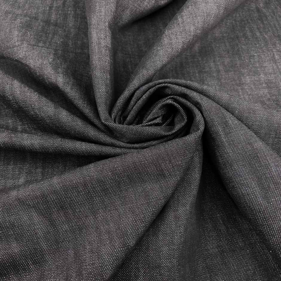 Black medium-weight cotton denim and non-stretch. Perfect for jackets. High-quality deadstock collected in Stock from a Maison de Couture in Italy.