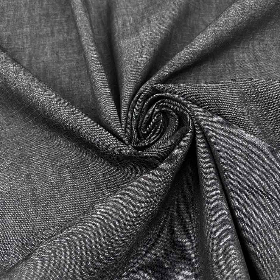 Black melange lightweight cotton denim, soft and non-stretch. Perfect trousers. High-quality deadstock collected in Stock from a Maison de Couture in Italy.