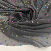 Transparent fil coupé in black background polyester. High-quality deadstock fabric by the meter collected in Stock from a Maison de Couture in Italy.