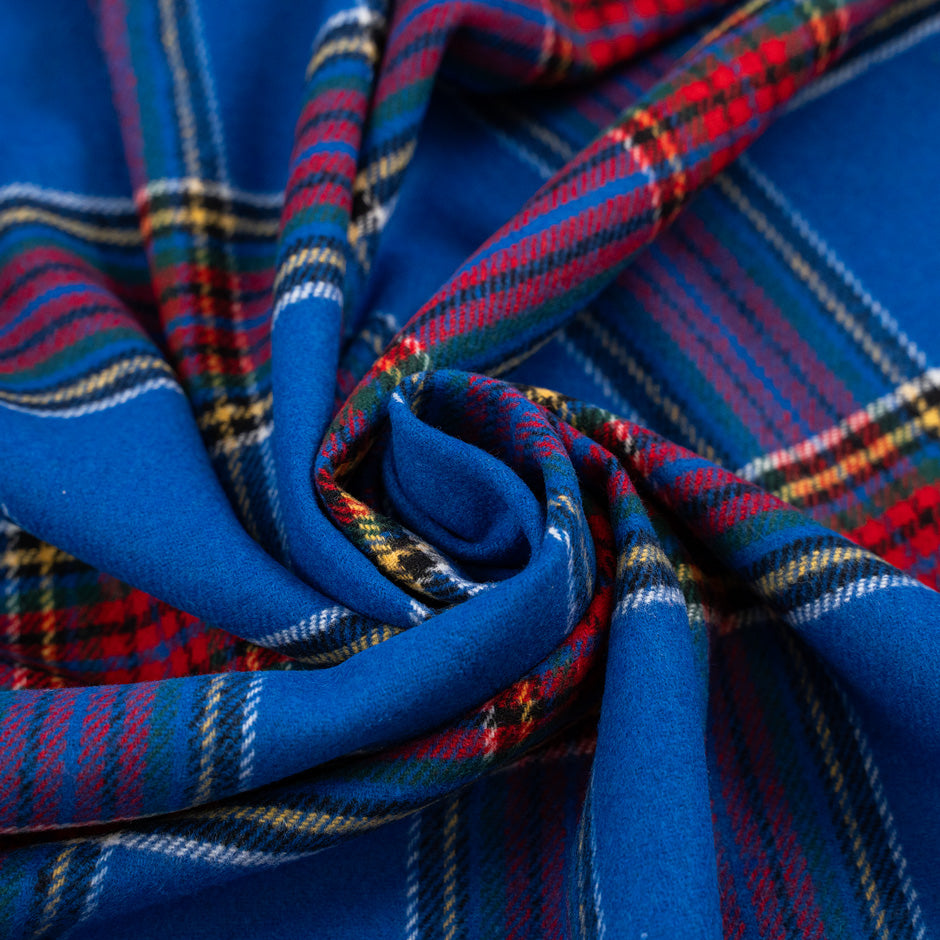 Blue and red madras tartan flannel fabric. It is soft and structured. High-quality deadstock fabric collected in Stock from a Maison de Couture in Italy.