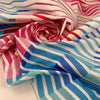 Stretch cotton with mixed print in white, pink, blue and turquoise shades. The fabric is structured. High-quality deadstock fabric by the meter collected in Stock from a Maison de Couture in Italy.