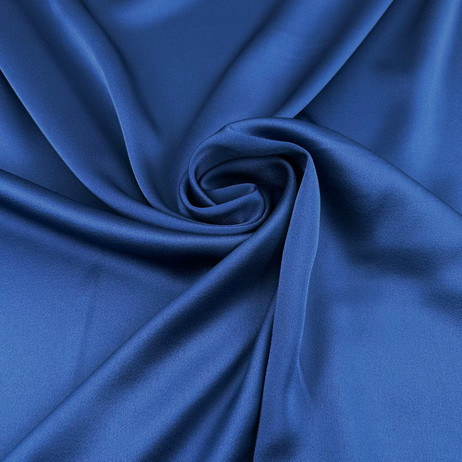 Blue double-face viscose-acetate crepe satin cady, soft, fluid and non-stretch. High-quality deadstock collected in Stock from a Maison de Couture in Italy.