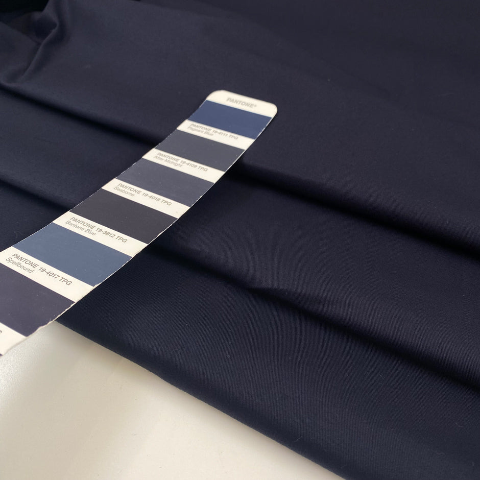 Very soft, medium-weight elasticized cotton in a rich midnight blue. Not transparent and ideal for structured yet comfortable garments. High-quality deadstock collected in Stock from a Maison de Couture in Italy.