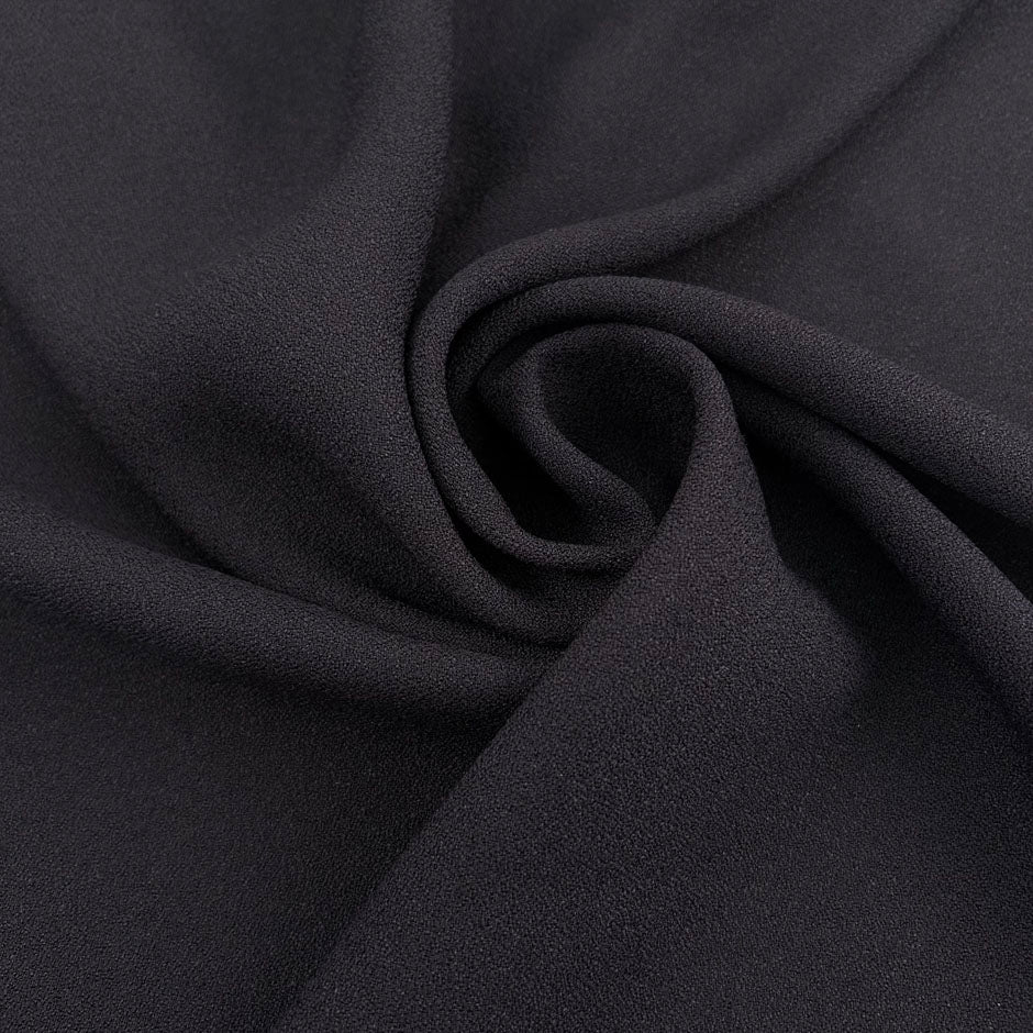 Black pure viscose crepe de chine, soft, fluid and non-stretch. High-quality deadstock collected in Stock from a Maison de Couture in Italy.
