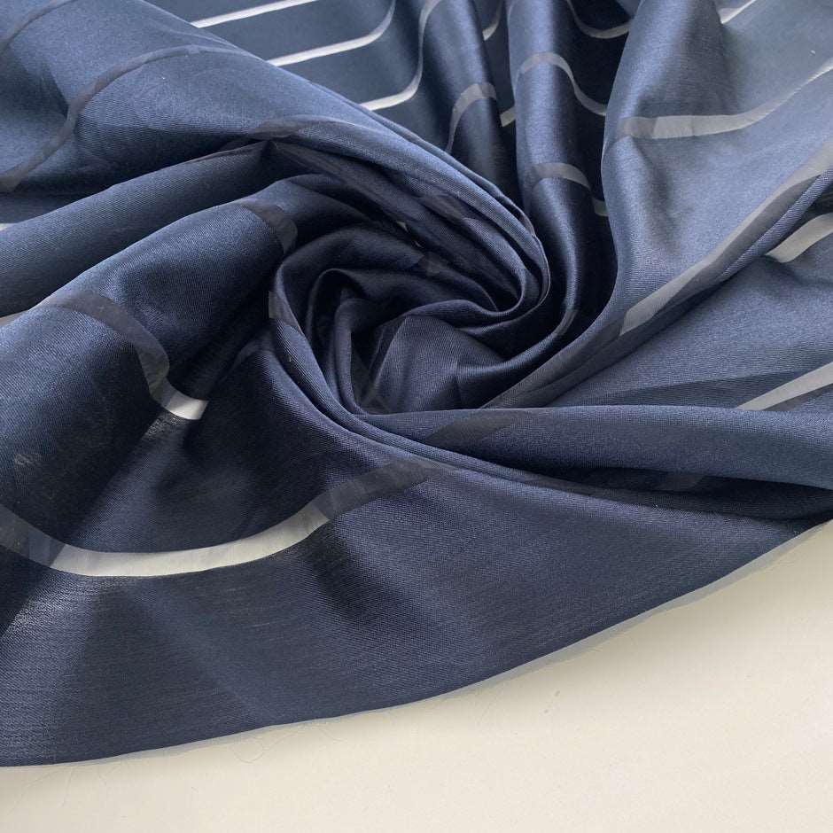 Blue silk and polyester organza with stripes. High-quality deadstock fabric collected in Stock from a Maison de Couture in Italy.