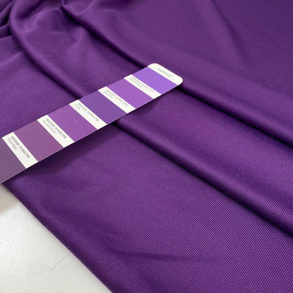 Polyester jersey in violet, very soft, light, and slightly shiny, ideal for dresses, tops, and layering pieces. High-quality deadstock collected in Stock from a Maison de Couture in Italy.
