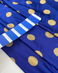 Pure and cold viscose jersey in blue, polka dots design in mustard. Bi-stretch, soft and light. High-quality deadstock fabric collected in Stock from a Maison de Couture in Italy.