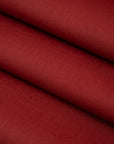 Soft and falling pure red wool gabardine. High-quality deadstock fabric collected in Stock from a Maison de Couture in Italy.