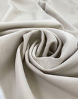 Polyester and elastane cady very light, beige soft and flowy, not transparent and textured. High-quality deadstock fabric collected in Stock from a Maison de Couture in Italy.