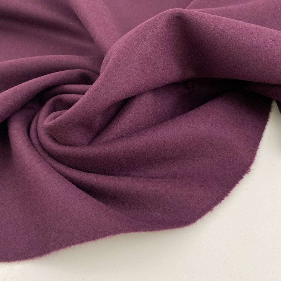 Bordeaux strucutured pure wool cloth. High quality deadstock fabric.