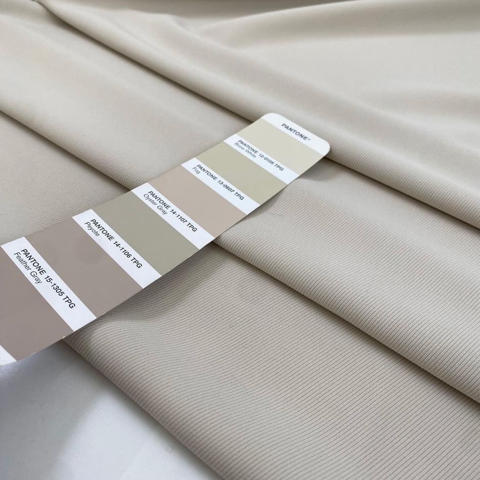 Polyester and elastane cady very light, beige soft and flowy, not transparent and textured. High-quality deadstock fabric collected in Stock from a Maison de Couture in Italy.