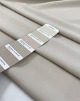 Polyester and elastane cady very light, beige soft and flowy, not transparent and textured. High-quality deadstock fabric collected in Stock from a Maison de Couture in Italy.