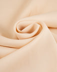 Medium weight creamy white viscose crepe cady. High quality deadstock fabric.