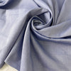 Pure cotton poplin in light blue color reference Eventide. Very soft and light, ideal for shirting, dresses and skirts. High-quality deadstock collected in Stock from a Maison de Couture in Italy.