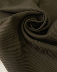 Elegant wool fabric with a diagonal line pattern. Soft, warm, and versatile, perfect for jackets, skirts, trousers, and dresses.High-quality deadstock collected in Stock from a Maison de Couture in Italy.