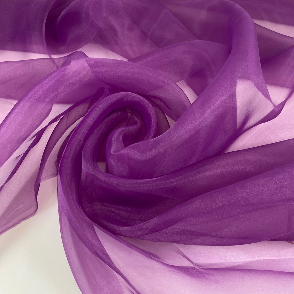 Purple polyester organza very soft, light, and transparent a little shiny. High-quality deadstock fabric collected in Stock from a Maison de Couture in Italy.