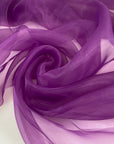 Purple polyester organza very soft, light, and transparent a little shiny. High-quality deadstock fabric collected in Stock from a Maison de Couture in Italy.