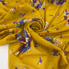 Pure cotton voile with an ochre base and floral print in violet, light blue, white, and orange. Soft, light, and slightly transparent. Ideal for dresses, skirts, and shirting.
High-quality deadstock collected in Stock from a Maison de Couture in Italy.