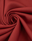 Soft and falling pure red wool gabardine. High-quality deadstock fabric collected in Stock from a Maison de Couture in Italy.