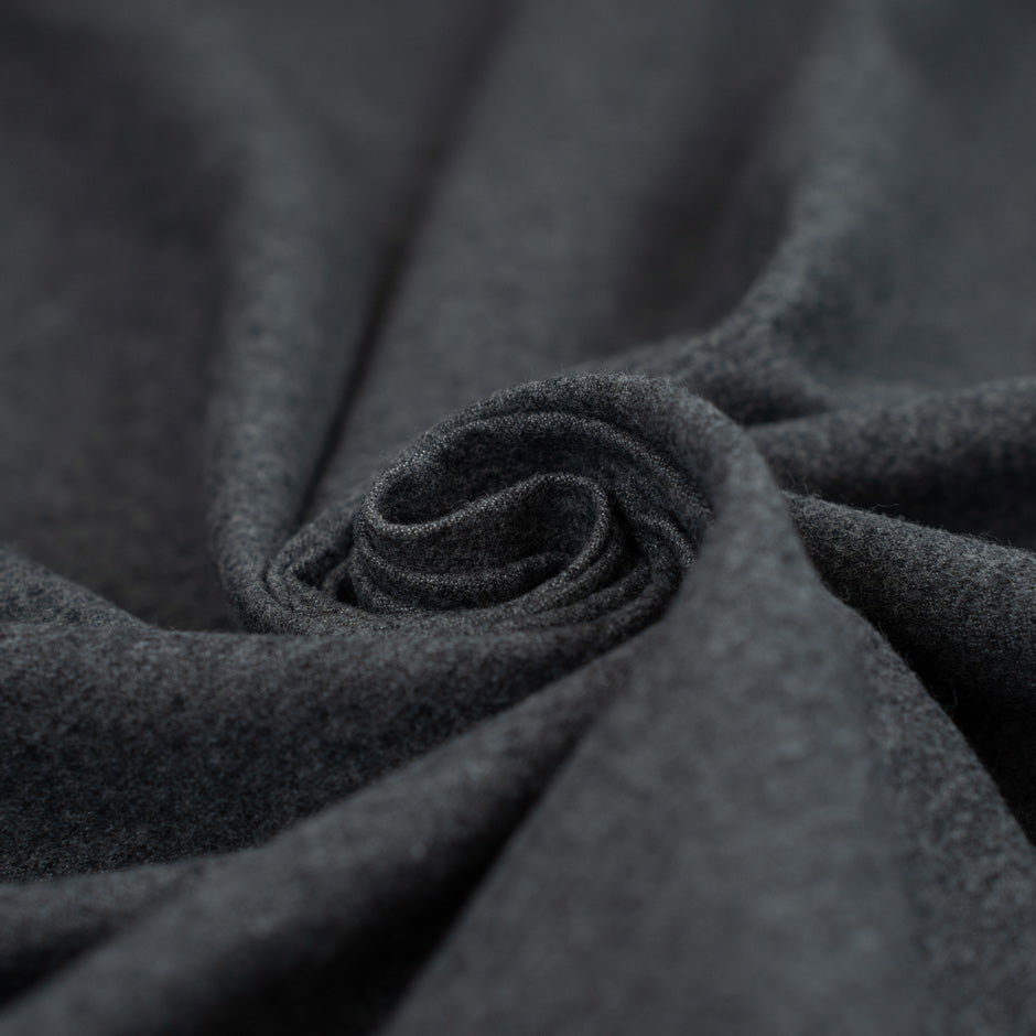 Dark gray colored heavy and falling cotton flannel. &nbsp;High-quality deadstock fabric collected in Stock from a Maison de Couture in Italy.