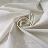 Cotton, polyester and elastane blend in white Marshmallow. Soft, not transparent, with a subtle micro texture. Ideal for trousers, dresses and skirts. High-quality deadstock collected in Stock from a Maison de Couture in Italy.