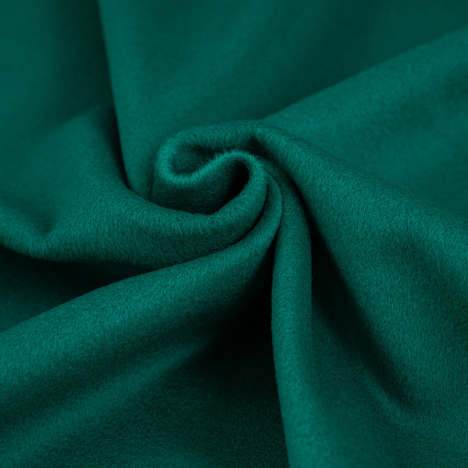 Green soft coat made of virgin wool and cashmere. High quality deadstock fabric.