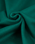 Green soft coat made of virgin wool and cashmere. High quality deadstock fabric.