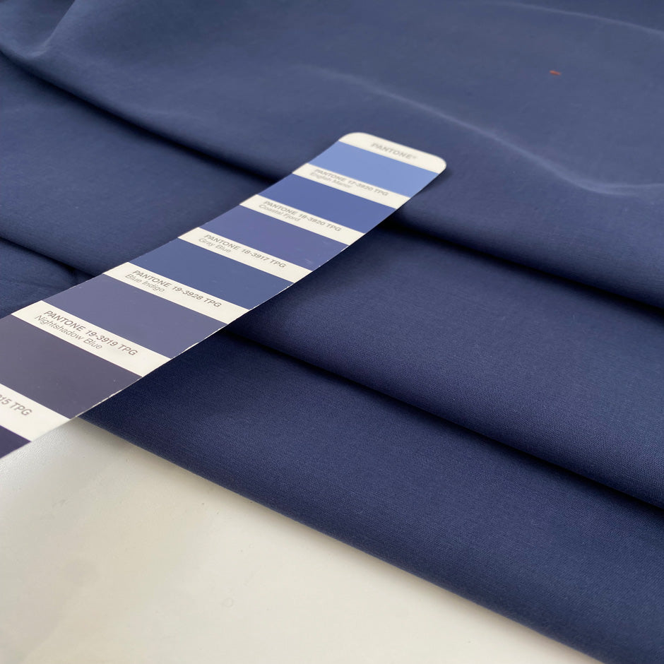Pure cotton fabric in blue, very thick and stiff with a dry handfeel, ideal for structured garments, jackets, and utility pieces. High-quality deadstock collected in Stock from a Maison de Couture in Italy.