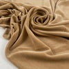 Very soft and stretchy chenille in cotton and polyamide, flowy and not transparent. In a camel color reference Latte. Ideal for dresses, trousers, skirts and also for jackets. High-quality deadstock collected in Stock from a Maison de Couture in Italy.