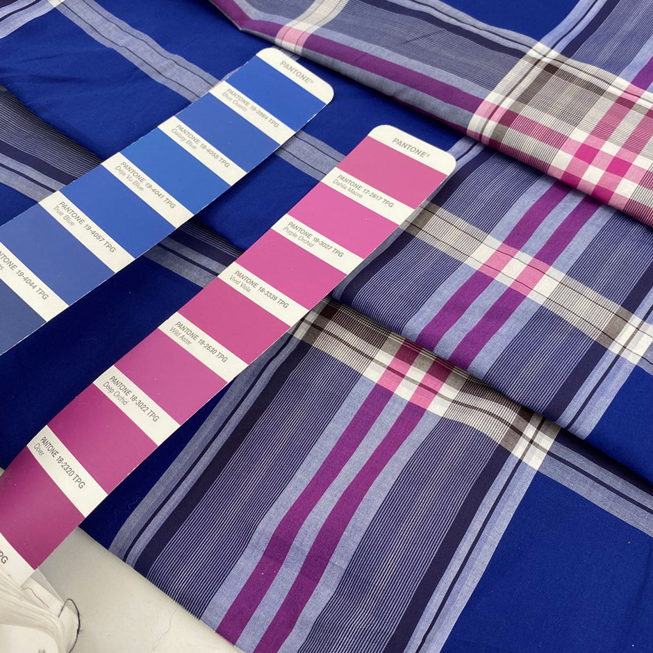 Pure cotton poplin with a check pattern in the shades of purple orchid and sodalite blue. Very soft, not transparent, and a little bit crunchy. Ideal for shirting, dresses, and skirts. High-quality deadstock collected in Stock from a Maison de Couture in Italy.
