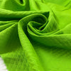 Pure cotton jacquard in green color reference Jasmine Green. Very soft and flowy, not transparent. Ideal for dresses, skirts, trousers, and jackets. High-quality deadstock collected in Stock from a Maison de Couture in Italy.