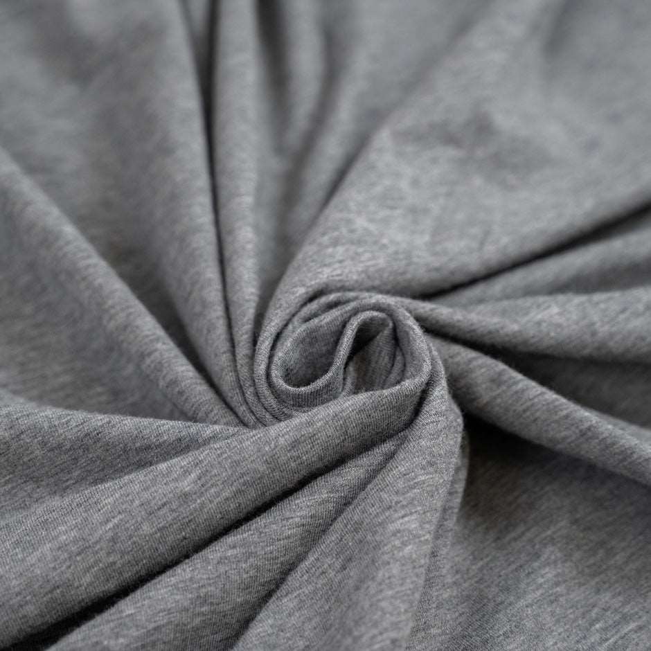 Grey cotton jersey, soft and stretchy. High-quality deadstock fabric collected in Stock from a Maison de Couture in Italy.