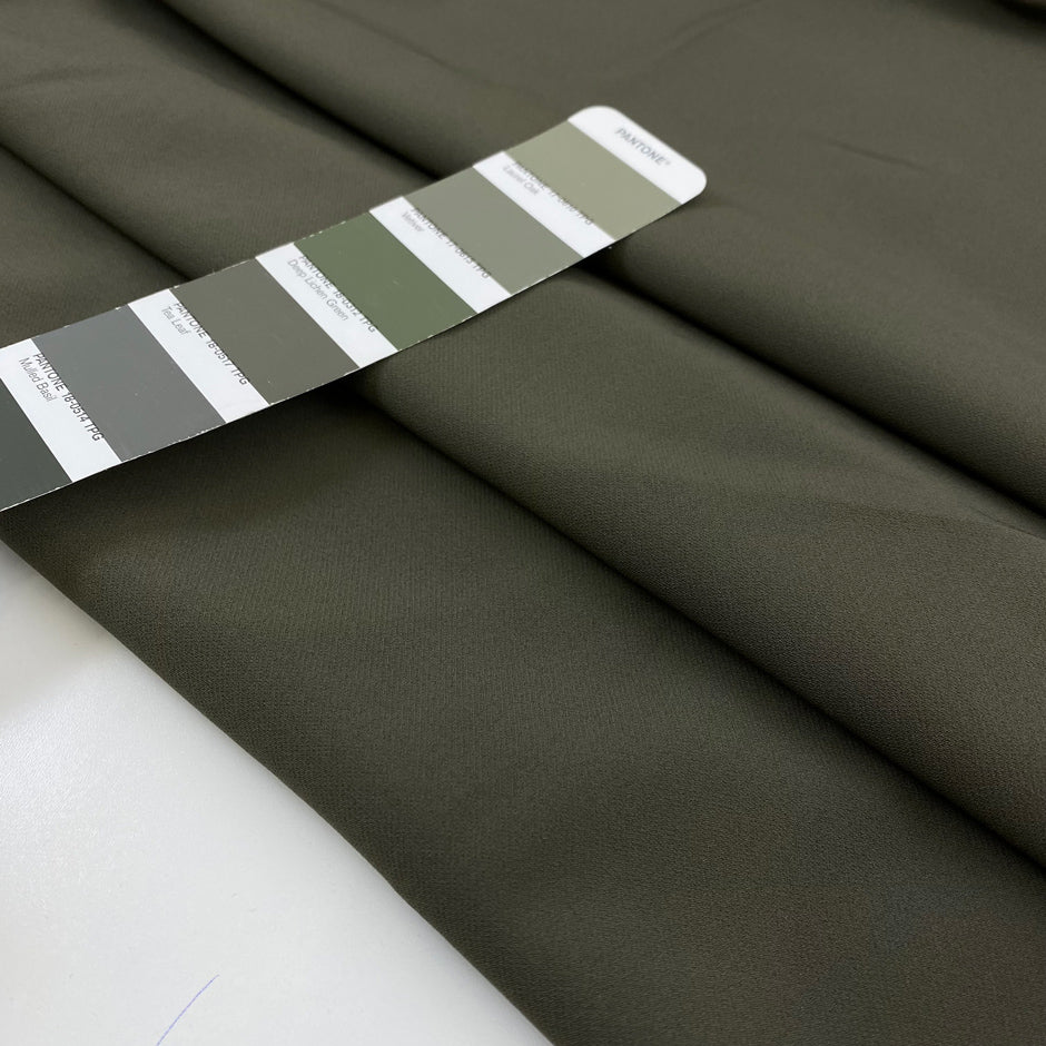 Stretch cotton cady in mud color, very soft and flowy, ideal for dresses, trousers, and elegant separates. High-quality deadstock collected in Stock from a Maison de Couture in Italy.