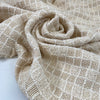 Heavy cotton tweed in vanilla white with check pattern and booklet texture. Very soft and structured, ideal for jackets, coats, and skirts. High-quality deadstock collected in Stock from a Maison de Couture in Italy.