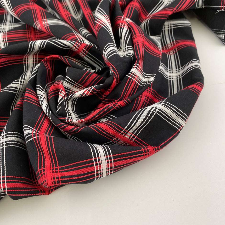 Yarn-dyed cotton and viscose jacquard with geometric design. High quality deadstock fabric.