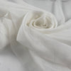 Pure cotton gauze in coconut milk white, very soft, light, and transparent. Flowy and breathable, ideal for dresses, shirting, and blouses. High-quality deadstock collected in Stock from a Maison de Couture in Italy.