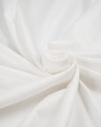 Pure white textured cotton jersey. High-quality deadstock fabric collected in Stock from a Maison de Couture in Italy.