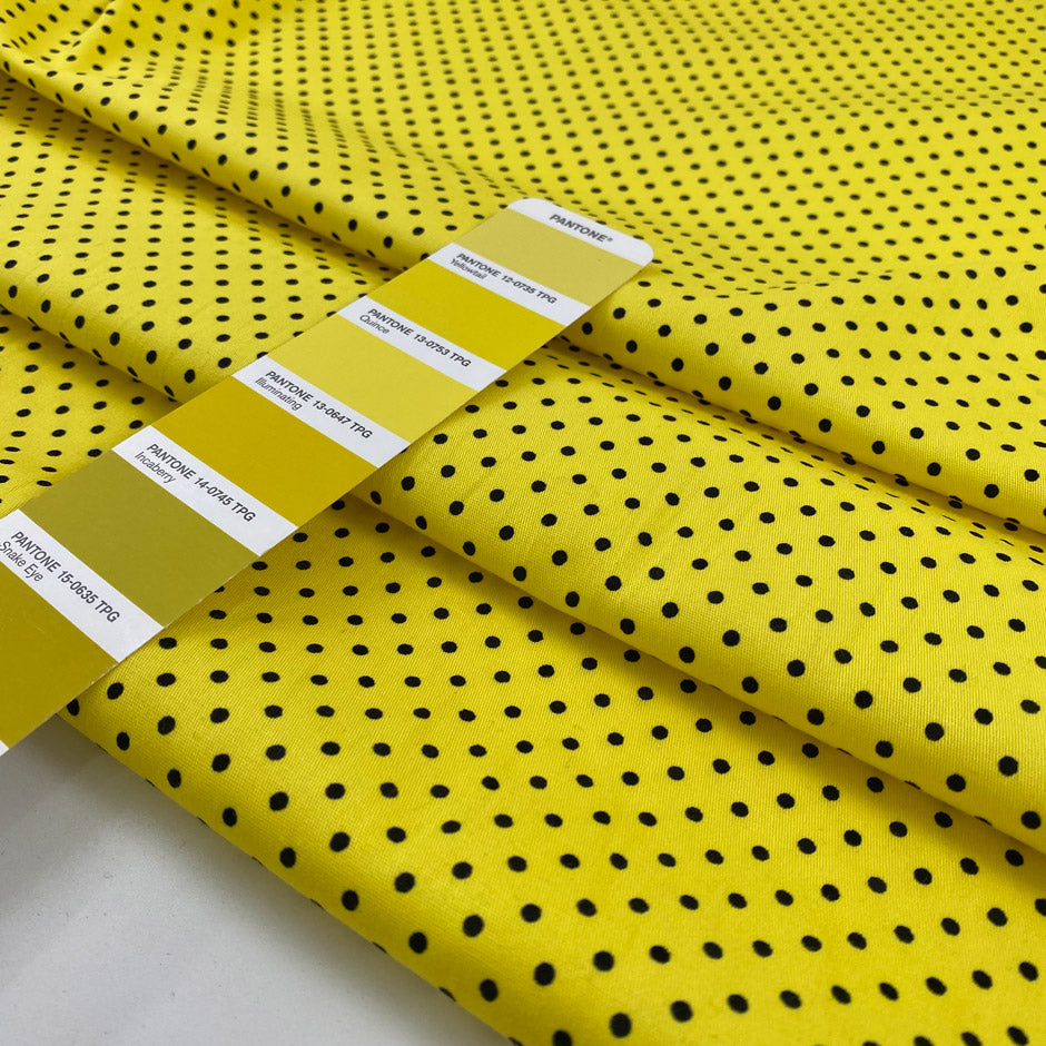 Pure cotton light gabardine with very bright yellow ground and black polka dots design. very soft medium weight. Ideal for dresses, skirts and shirts.High-quality deadstock collected in Stock from a Maison de Couture in Italy.