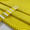 Pure cotton light gabardine with very bright yellow ground and black polka dots design. very soft medium weight. Ideal for dresses, skirts and shirts.High-quality deadstock collected in Stock from a Maison de Couture in Italy.
