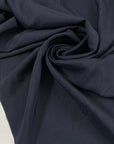 Dark blue silk crepe de chine, soft, stretchy and light. High-quality deadstock fabric collected in Stock from a Maison de Couture in Italy.