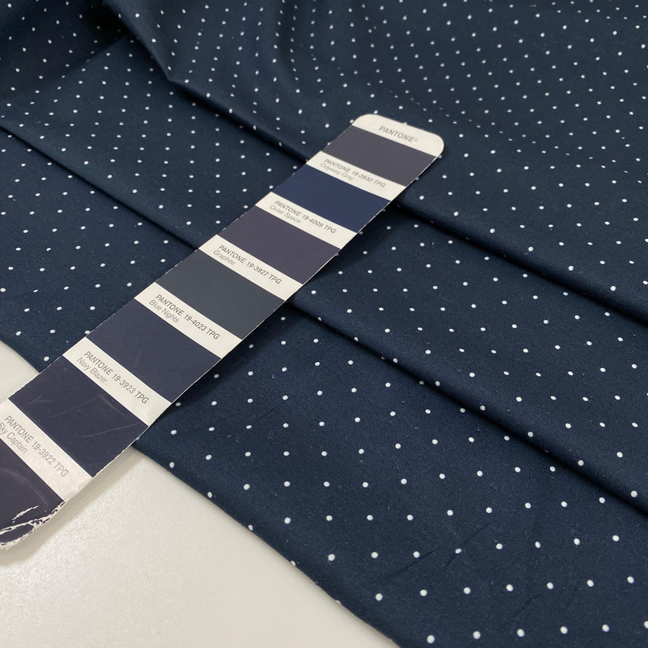 Cotton poplin with polka dot design in dark blue and white, very soft, light, and not transparent, ideal for shirts, dresses, and skirts. High-quality deadstock collected in Stock from a Maison de Couture in Italy.