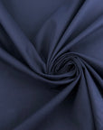 Dark blue cotton gabardine with a soft, non-stretch finish. High-quality deadstock collected in Stock from a Maison de Couture in Italy.